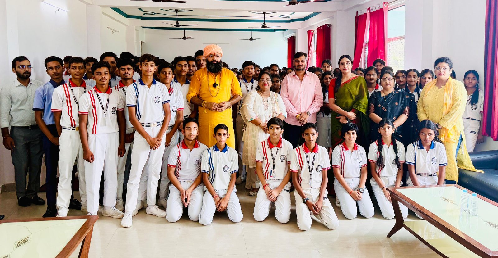 Kabeer Ji Maharaj with students and teachers during a school session